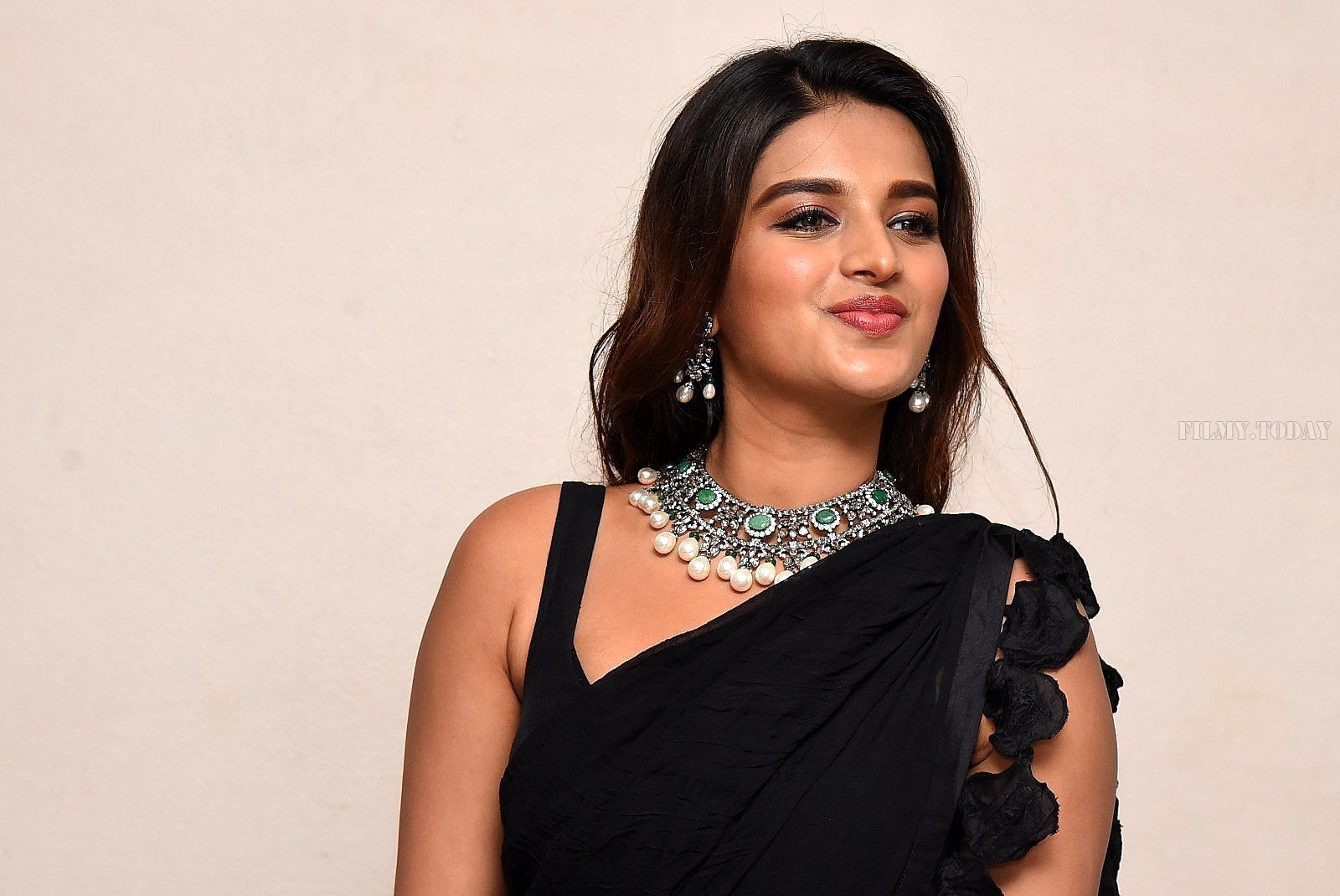 In Pics: Nidhhi Agerwal In Black Saree At Ismart Shankar Pre Release Event | Picture 1662742