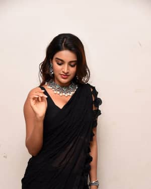 In Pics: Nidhhi Agerwal In Black Saree At Ismart Shankar Pre Release Event | Picture 1662709