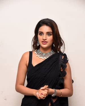 In Pics: Nidhhi Agerwal In Black Saree At Ismart Shankar Pre Release Event | Picture 1662720