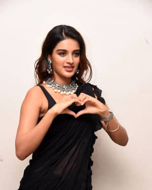 In Pics: Nidhhi Agerwal In Black Saree At Ismart Shankar Pre Release Event | Picture 1662715