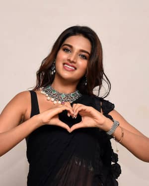 In Pics: Nidhhi Agerwal In Black Saree At Ismart Shankar Pre Release Event | Picture 1662729