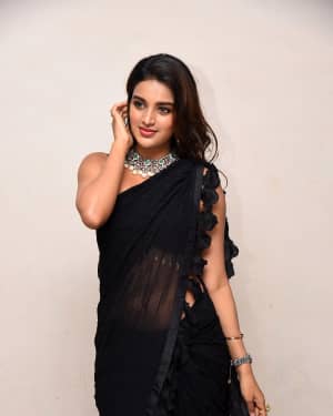 In Pics: Nidhhi Agerwal In Black Saree At Ismart Shankar Pre Release Event | Picture 1662721