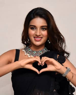 In Pics: Nidhhi Agerwal In Black Saree At Ismart Shankar Pre Release Event | Picture 1662730